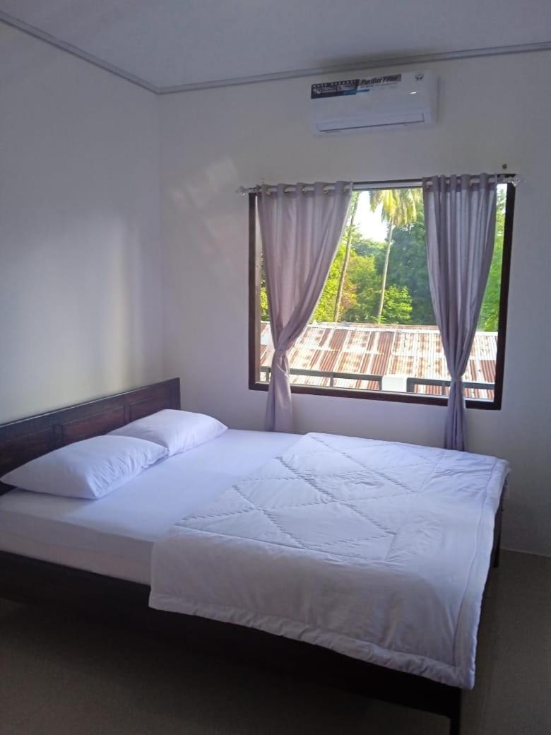 Riung Tiga Empat Tujuh Guesthouse Exterior photo